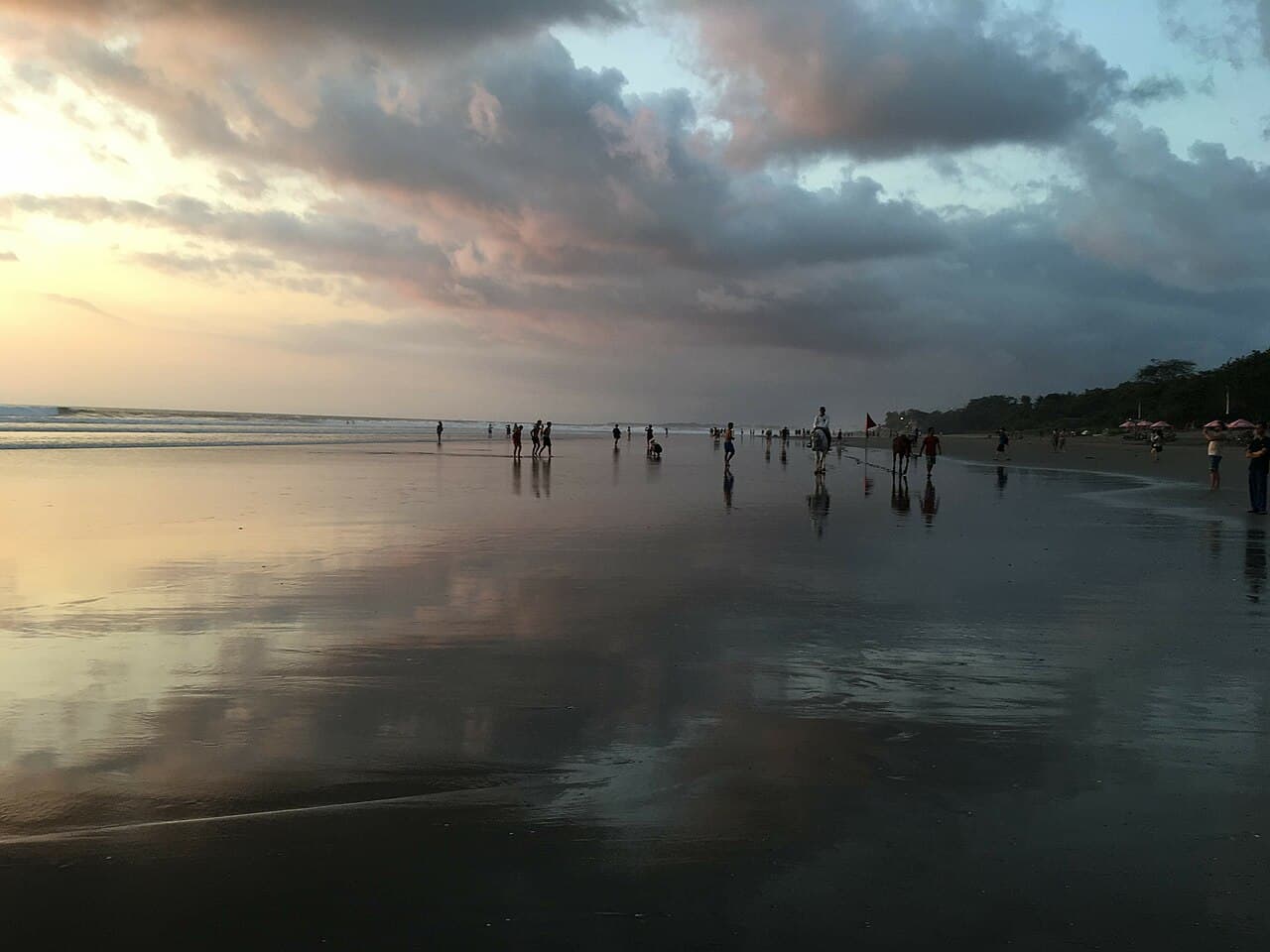 Seminyak Beach in Bali with surf and beachfront hotels