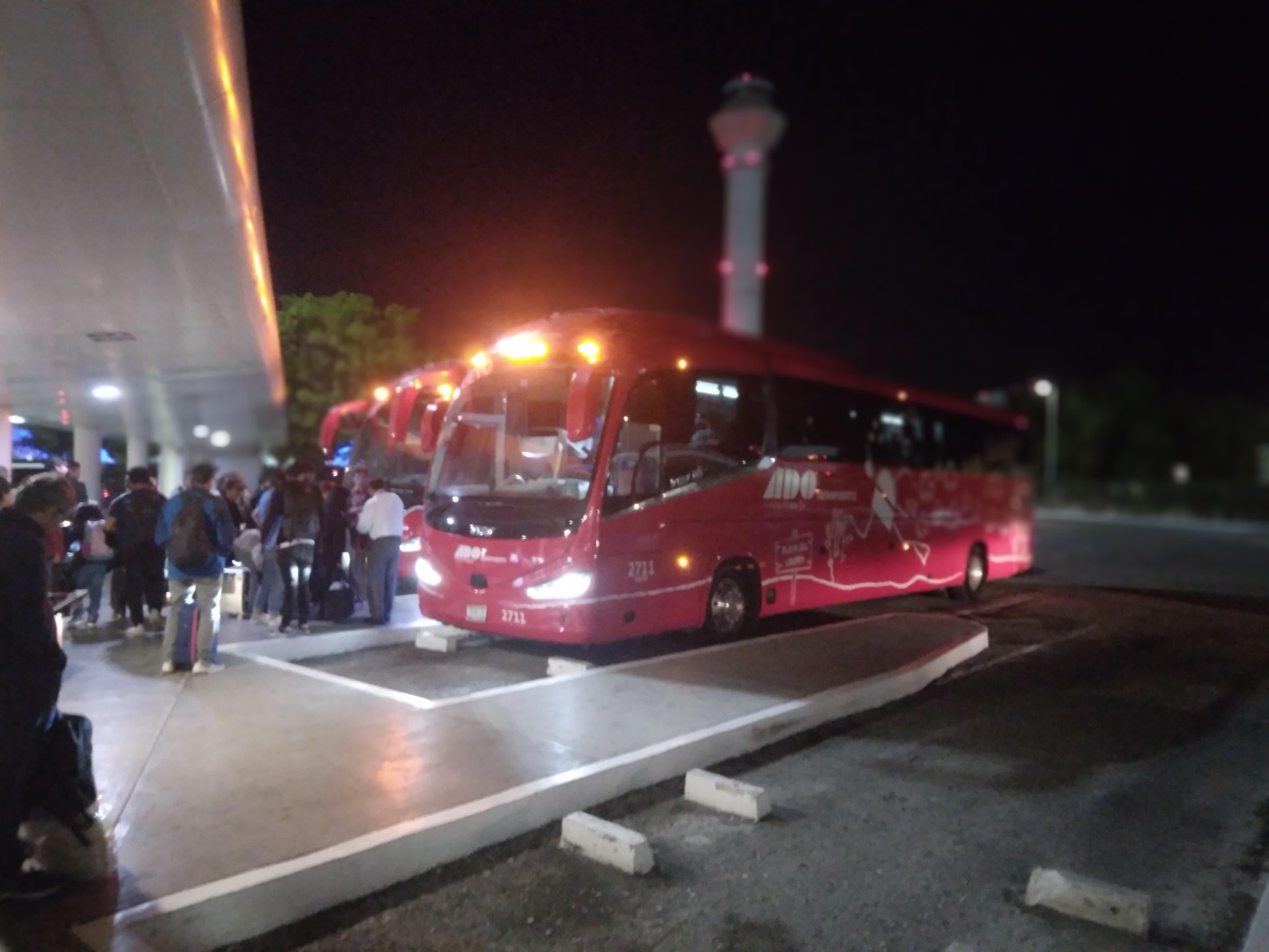 ADO bus platforms at Cancun International Airport