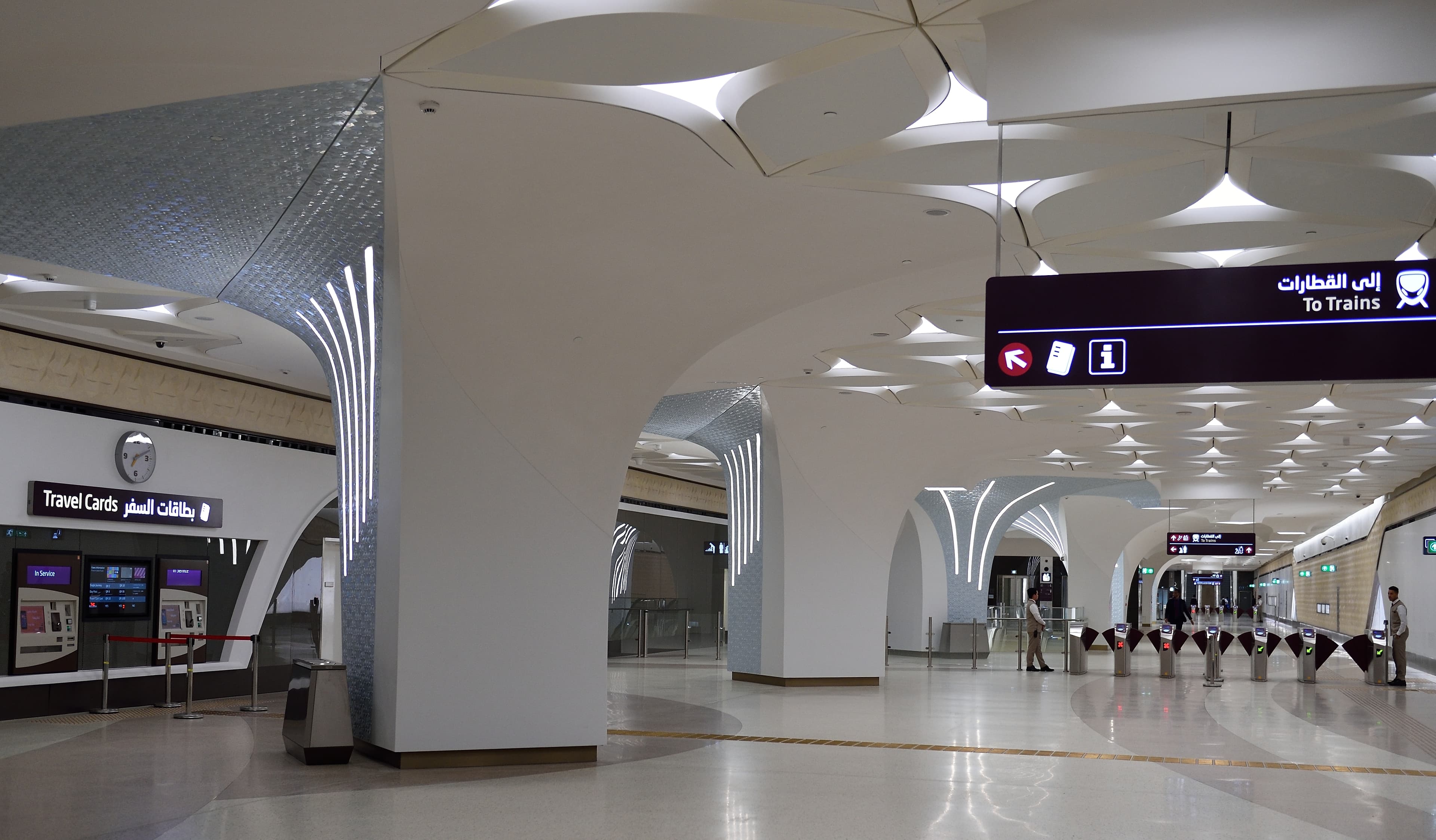 A bright Doha Metro station concourse
