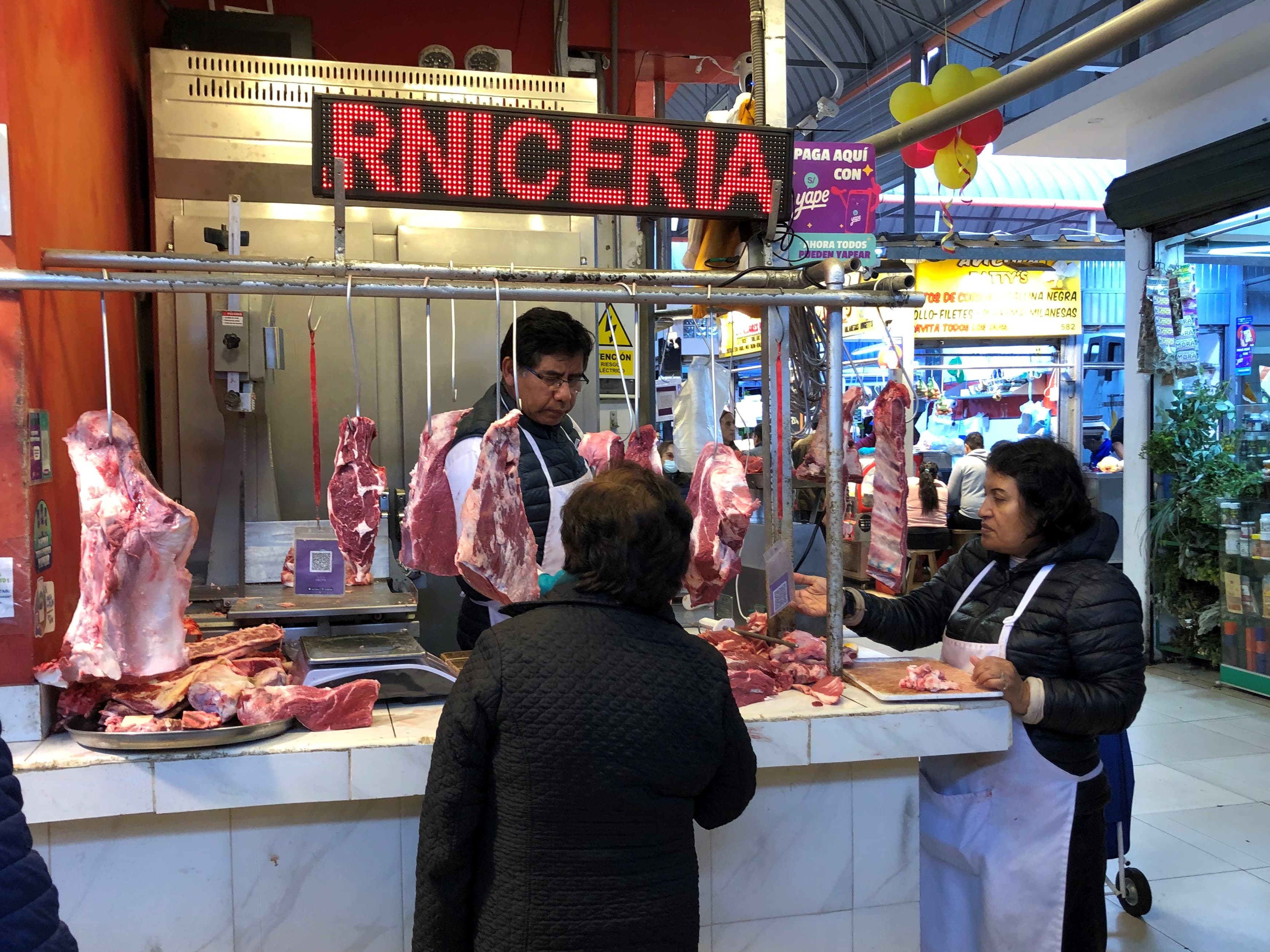 Produce stalls at Surquillo Market in Lima