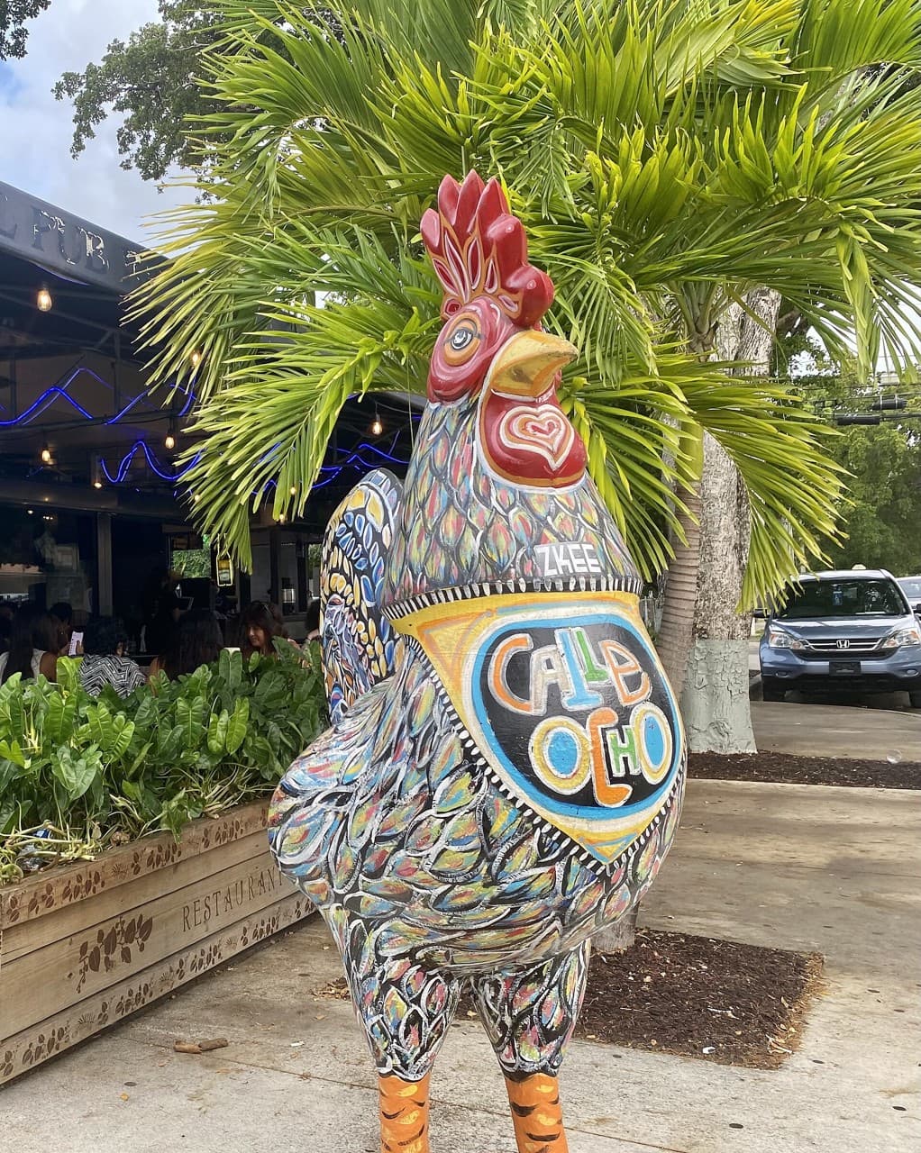Calle Ocho street art and rooster sculpture in Little Havana