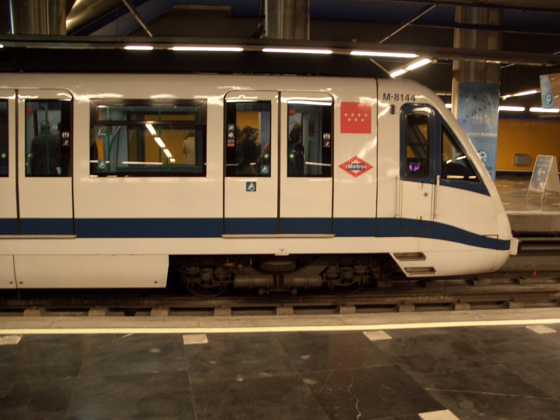 A Madrid Metro train at a station platform