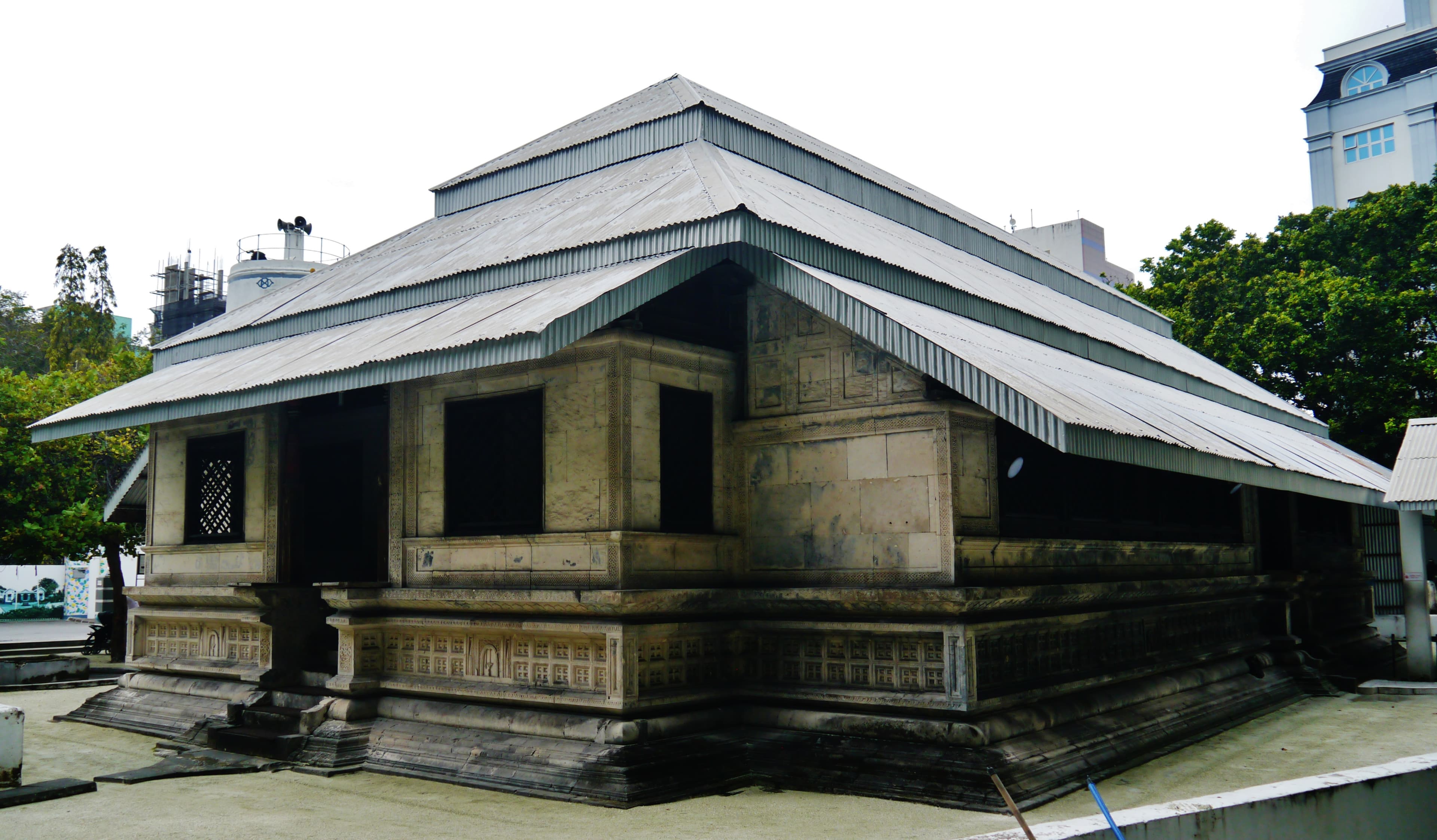 Male Hukuru Miskiy, the Old Friday Mosque, with coral-stone walls and surrounding cemetery